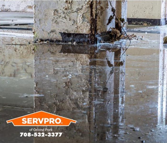 A flooded parking garage is shown.